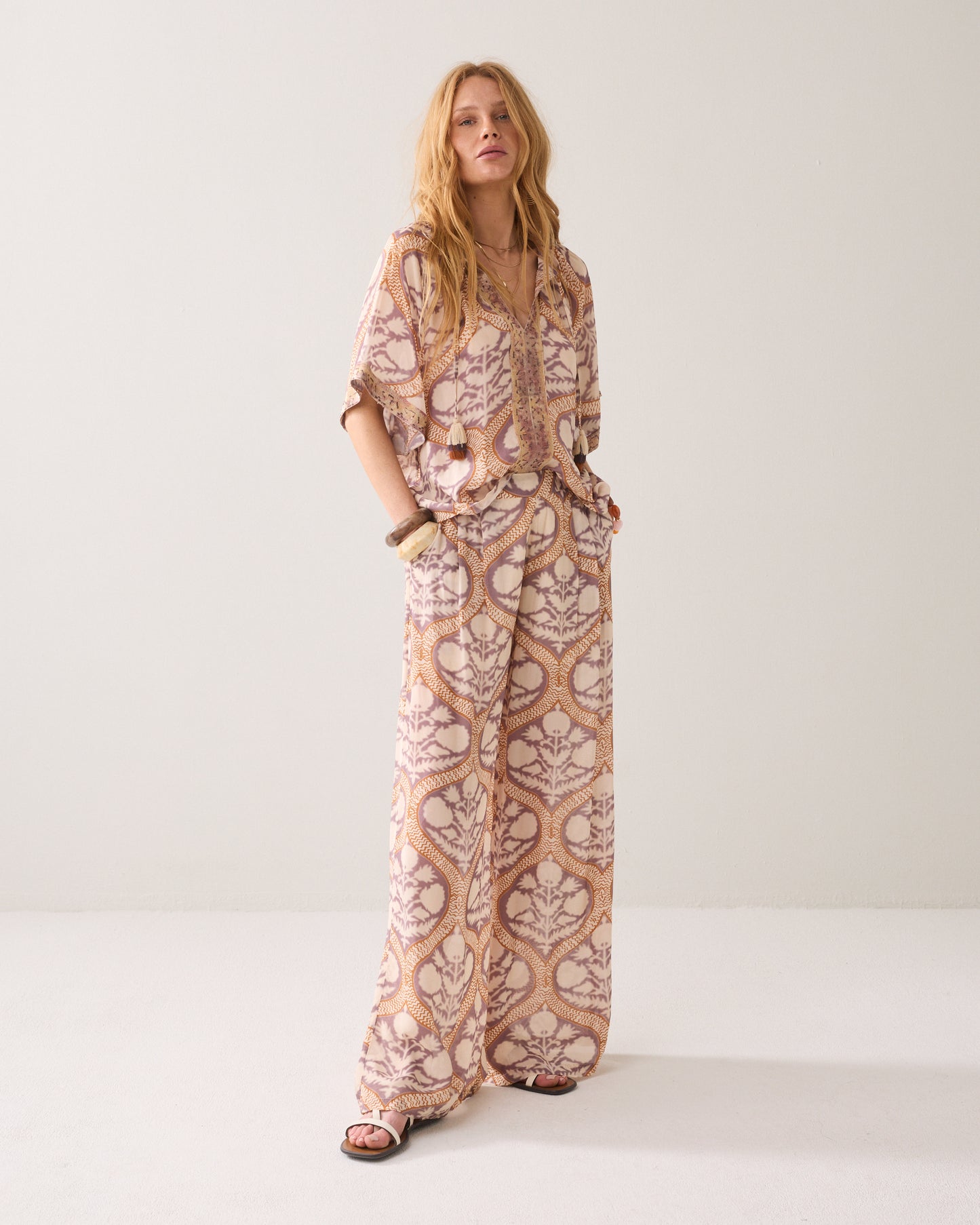 Summum Art Deco Print Trousers.