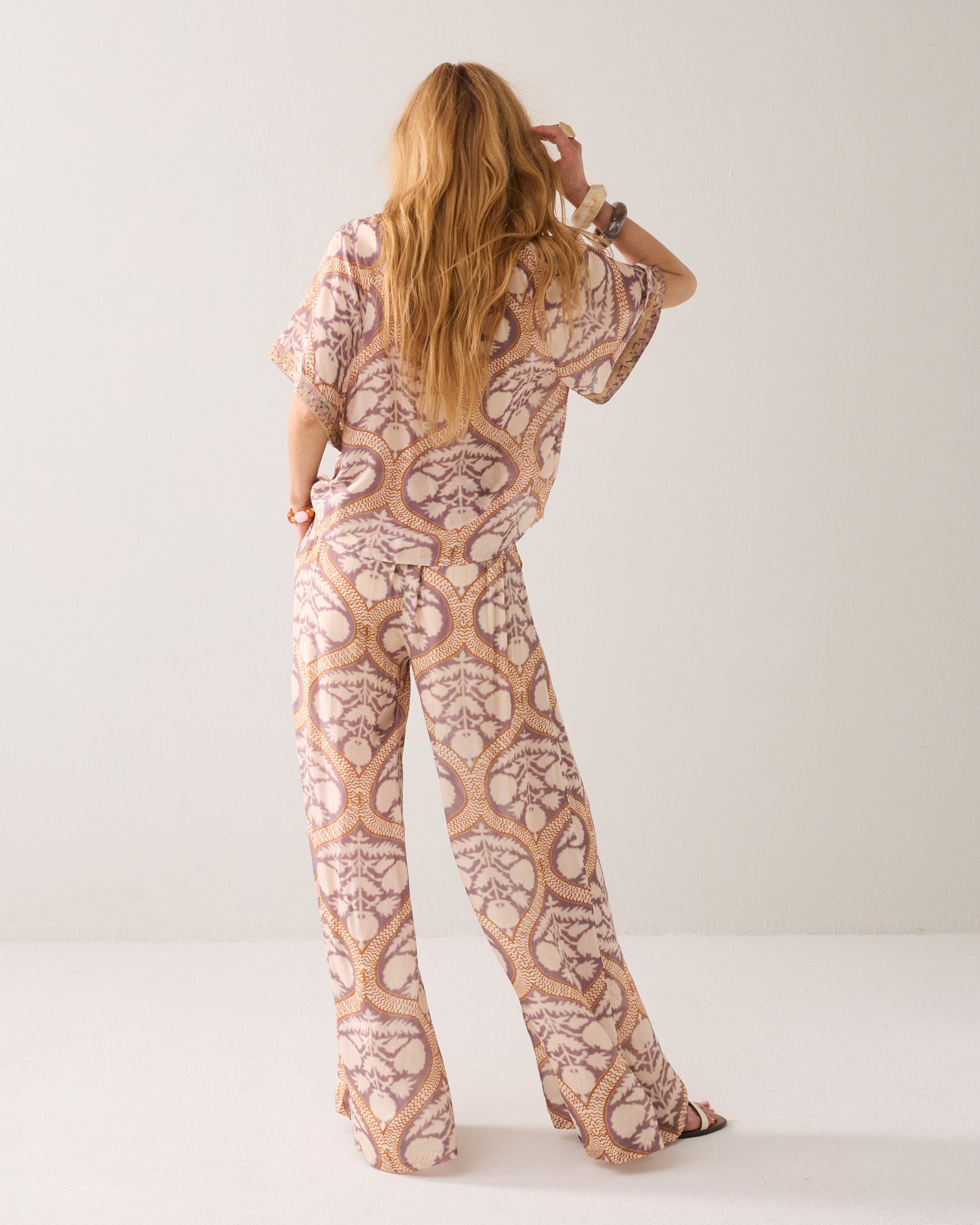 Summum Art Deco Print Trousers.